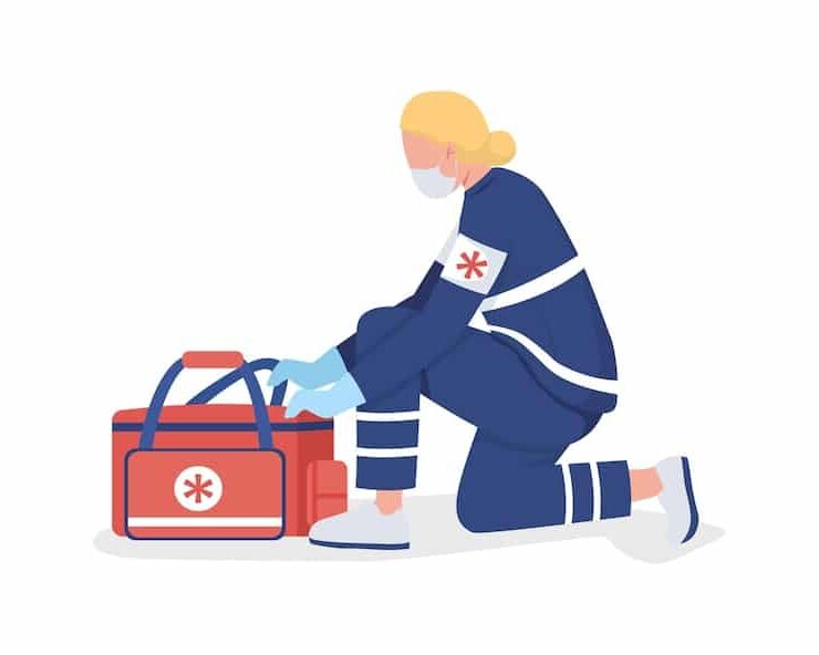 female paramedic with first aid kit
