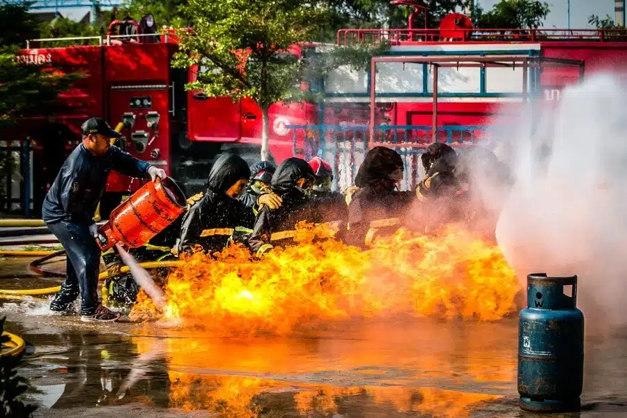 fire fighters against buildings